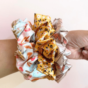 New Love - Pack of 3 Printed XL Scrunchies - Daisy, Happy, Ruby on hand